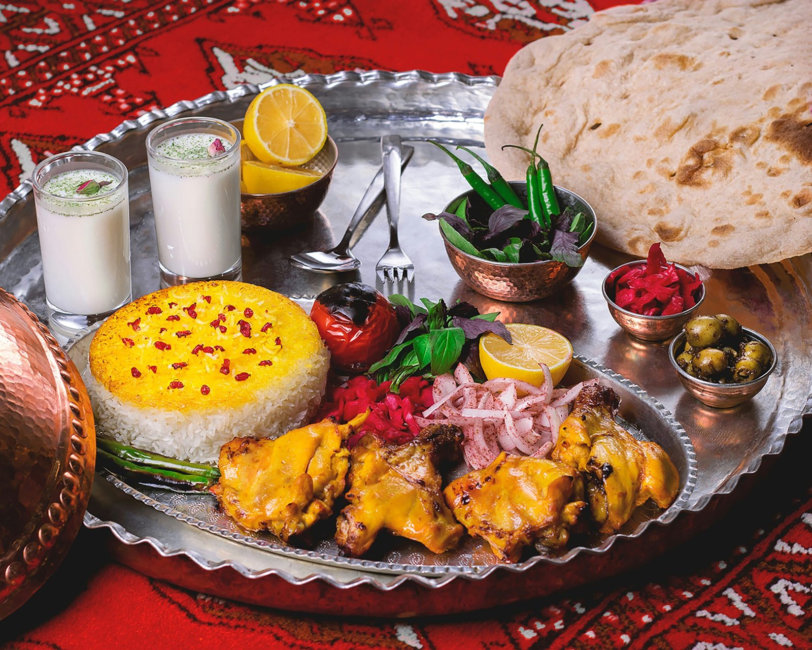 A table spread showcasing various Ayurvedic foods for Vata, Pitta, and Kapha diets.