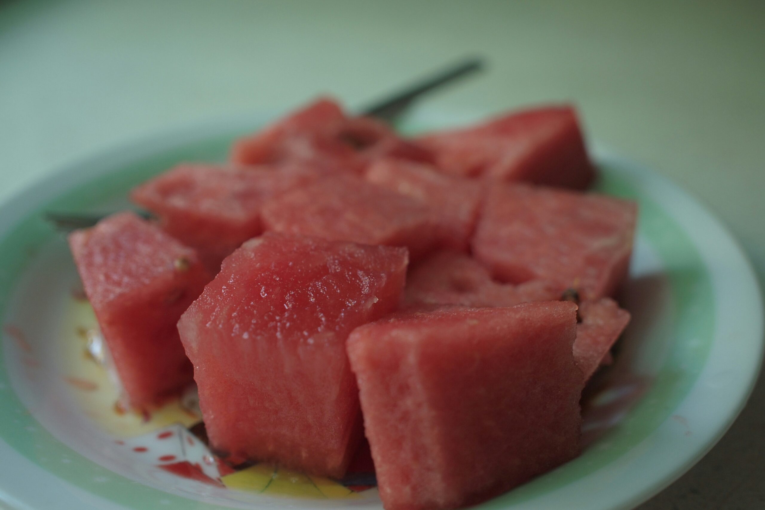 sliced watermelon on white plate